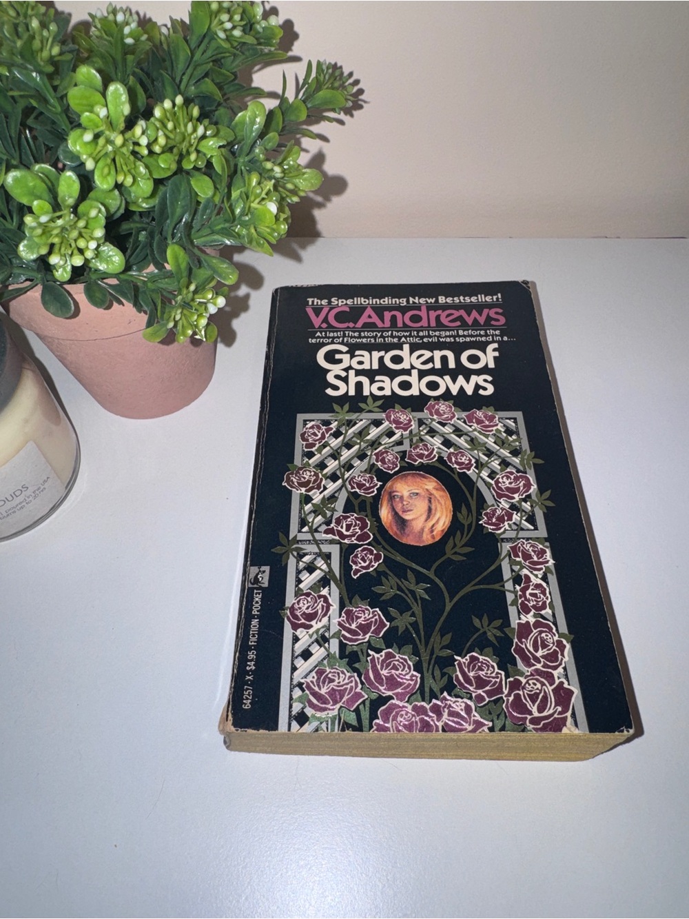 Garden of Shadows Paperback Book - Black Cover with Pink Floral Design